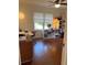 Bright bedroom with a desk, shelves, and natural light, offering a functional workspace at 4704 Winchester Dr, Sarasota, FL 34234