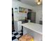 Modern kitchen boasting stainless steel appliances and ample countertop space at 4704 Winchester Dr, Sarasota, FL 34234