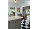 Open-concept kitchen showcasing stylish cabinetry and a glimpse into the adjoining living areas at 4704 Winchester Dr, Sarasota, FL 34234