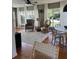 Bright living room showcasing hardwood floors, natural light and stylish decor, ready to move in at 4704 Winchester Dr, Sarasota, FL 34234
