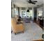 Cozy living room with a rug, armchair, and natural lighting, perfect for relaxation at 4704 Winchester Dr, Sarasota, FL 34234