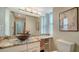 Bathroom vanity with double bowl sinks and granite countertop at 4861 Waterbridge Down, Sarasota, FL 34235