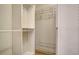 Custom designed walk-in closet with lots of shelving, hanging and storage space at 4861 Waterbridge Down, Sarasota, FL 34235
