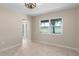 Cozy dining room with natural light, tile flooring, and views of the outdoors perfect for Gathering meals at 5403 Red Rooster Rd, Parrish, FL 34219