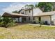 Home with a covered patio area providing ample space for outdoor living at 5403 Red Rooster Rd, Parrish, FL 34219