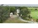 Lovely property featuring a charming home, lush landscaping and outbuilding on acreage at 5403 Red Rooster Rd, Parrish, FL 34219