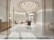 Luxury lobby with elegant chandelier, marble floors, and stylish seating, creating a sophisticated and inviting atmosphere at 555 Quay Cmn # 405, Sarasota, FL 34236