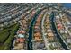 Aerial view showcasing a residential community with waterfront properties and private boat docks along canals at 569 Mast Dr, Bradenton, FL 34208