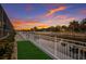 Waterfront backyard with dock and fenced yard at 569 Mast Dr, Bradenton, FL 34208