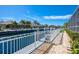 Private dock with a boat lift provides direct access to a scenic canal and waterways at 569 Mast Dr, Bradenton, FL 34208