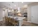 Well-equipped kitchen with a large island, breakfast bar, stainless steel appliances, and ample cabinet space at 569 Mast Dr, Bradenton, FL 34208
