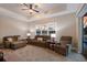 Comfortable living room with plush seating, a ceiling fan, and neutral décor at 569 Mast Dr, Bradenton, FL 34208