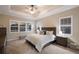Serene main bedroom featuring large windows and neutral color palette at 569 Mast Dr, Bradenton, FL 34208