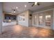 Outdoor kitchen with stainless steel appliances, brick pavers, and ceiling fans at 569 Mast Dr, Bradenton, FL 34208