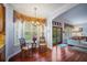 Charming breakfast nook with bright windows, comfortable seating, and elegant lighting fixture at 5716 Bayshore Blvd, Tampa, FL 33611