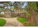 Charming two-story home with a neatly landscaped front yard and a brick-paved walkway at 5716 Bayshore Blvd, Tampa, FL 33611