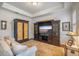 Comfortable living room with custom entertainment center, neutral color palette, and plush carpeting at 5716 Bayshore Blvd, Tampa, FL 33611
