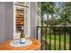 Charming patio view featuring a table with wine, overlooking a lush garden, perfect for relaxing afternoons at 5716 Bayshore Blvd, Tampa, FL 33611
