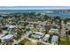 Scenic aerial view showcasing the property's neighborhood and stunning coastal views at 7030 Lois Ave, Longboat Key, FL 34228
