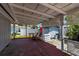 Covered back porch at 7030 Lois Ave, Longboat Key, FL 34228