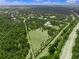 Large estate with pristine greenery, beautiful waterways, and luxury homes throughout the property at 7234 Letitia Ln, Sarasota, FL 34241
