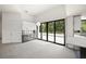 Dining area featuring sleek cabinetry and sliding glass doors to the outdoor space at 7234 Letitia Ln, Sarasota, FL 34241