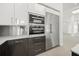 Modern kitchen featuring stainless steel appliances, sleek cabinetry, and ample counter space at 7234 Letitia Ln, Sarasota, FL 34241