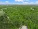 A beautiful plot of land surrounded by lush trees is ready to build your dream property at 7234 Letitia Ln, Sarasota, FL 34241