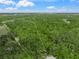 A beautiful plot of land surrounded by lush trees is ready to build your dream property at 7234 Letitia Ln, Sarasota, FL 34241