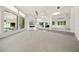Bright open living room featuring tile flooring, skylights and abundant natural light at 7234 Letitia Ln, Sarasota, FL 34241