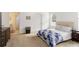Cozy bedroom with an ensuite bathroom, natural light, and neutral decor at 7526 Ridgelake Cir, Bradenton, FL 34203