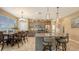Beautiful kitchen featuring pendant lighting, granite counters and stainless appliances at 8352 Enclave Way # 104, Sarasota, FL 34243