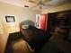 Bedroom with a ceiling fan, closet and view to ensuite bathroom at 8508 43Rd W Ave, Bradenton, FL 34209