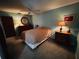 Comfortable bedroom with carpet, dresser, and neutral color scheme at 8508 43Rd W Ave, Bradenton, FL 34209