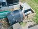 Exterior shot of equipment, including HVAC and water connections, situated next to lush grass at 8508 43Rd W Ave, Bradenton, FL 34209