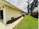 An angled exterior view of the home showing the driveway, lawn, and landscaping at 8508 43Rd W Ave, Bradenton, FL 34209