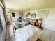 Bright sunroom with tile flooring, casual seating, and plenty of natural light at 8508 43Rd W Ave, Bradenton, FL 34209