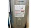 Close-up of water heater showing details, model number, and specifications at 8508 43Rd W Ave, Bradenton, FL 34209
