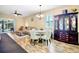 Bright living room showcases tile floors, lots of natural light, and comfortable furnishings at 9052 41St E St, Parrish, FL 34219