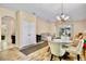 Open-concept living room features tile floors and access to the lanai at 9052 41St E St, Parrish, FL 34219