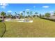 Community picnic area with tables and green space, designed for outdoor enjoyment and relaxation at 9646 Ivory Dr, Ruskin, FL 33573