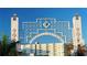 Iconic Sarasota Bayfront sign with architectural details, set against a clear blue sky at 1042 N Casey Key Rd, Osprey, FL 34229