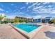 Community pool offers a large swimming area, tables, and umbrellas for residents to enjoy at 1065 Gulf Of Mexico Dr # 103, Longboat Key, FL 34228