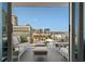 Relax on this beautiful balcony with comfortable seating and enjoy the scenic city views at 111 S Pineapple Ave # 716, Sarasota, FL 34236