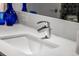 Modern bathroom sink featuring a sleek chrome faucet and white countertop at 111 S Pineapple Ave # 716, Sarasota, FL 34236