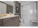 Bathroom featuring a modern vanity and a combined tub and shower at 111 S Pineapple Ave # 716, Sarasota, FL 34236