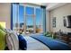 Bedroom featuring bright, natural light and views of the city skyline at 111 S Pineapple Ave # 716, Sarasota, FL 34236