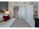 Bedroom offering a view of the en-suite bathroom and modern kitchen at 111 S Pineapple Ave # 716, Sarasota, FL 34236