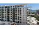 Contemporary condominium building with multiple balconies and views of the bay at 111 S Pineapple Ave # 716, Sarasota, FL 34236