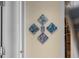 A captivating collection of blue and white modern artwork adds a touch of elegance to this interior at 111 S Pineapple Ave # 716, Sarasota, FL 34236